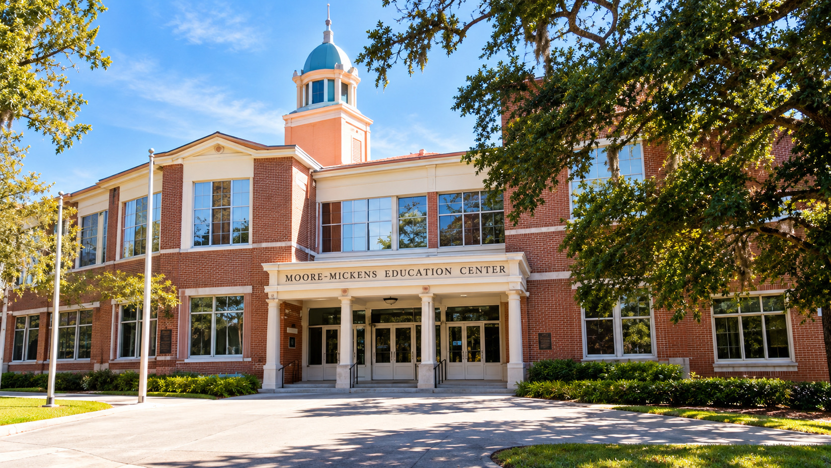 Front entrance and brick facade of the historic Moore-Mickens Education Center in Dade City